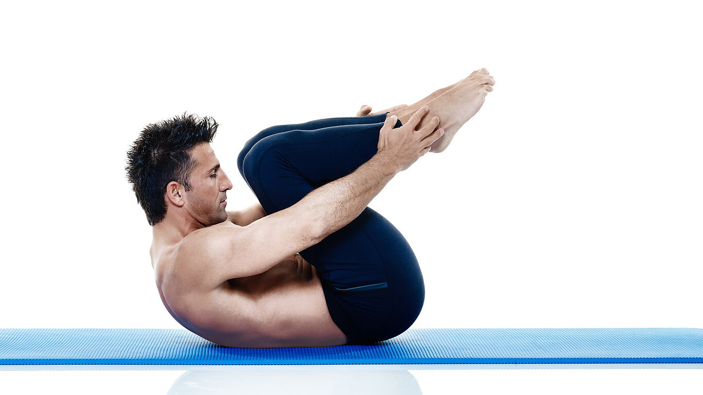 Rolling like a ball o rodar como una pelota. Ejercicio de Pilates